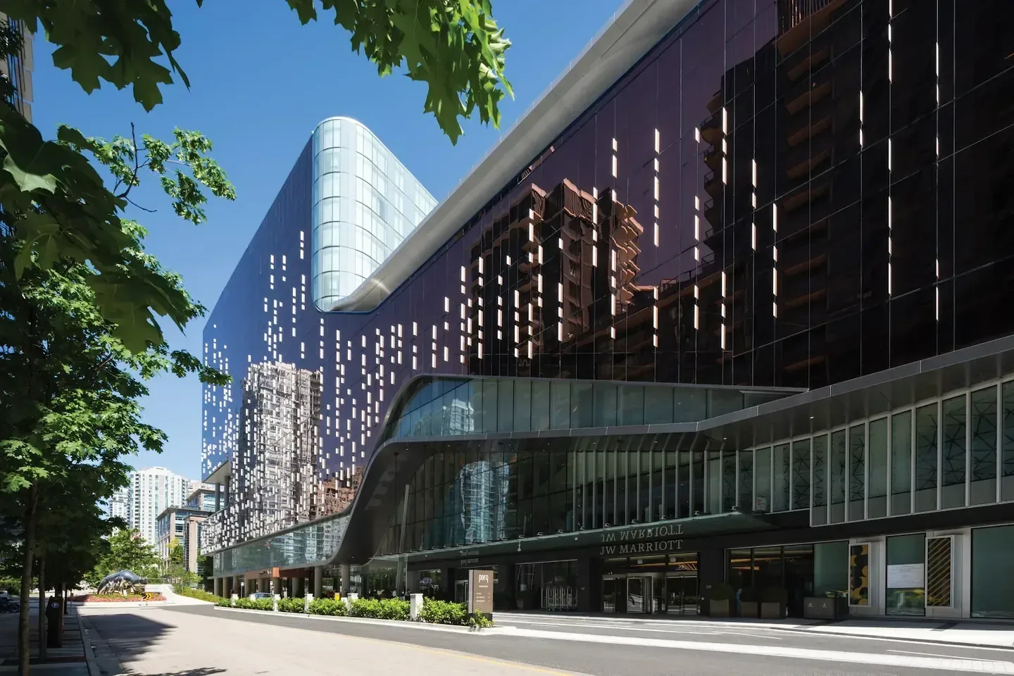 Glass and stone exterior of a downtown city hotel